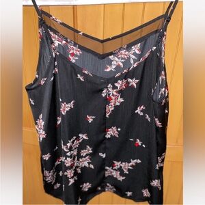 Black sleeveless camisole with scoop neck and backless design